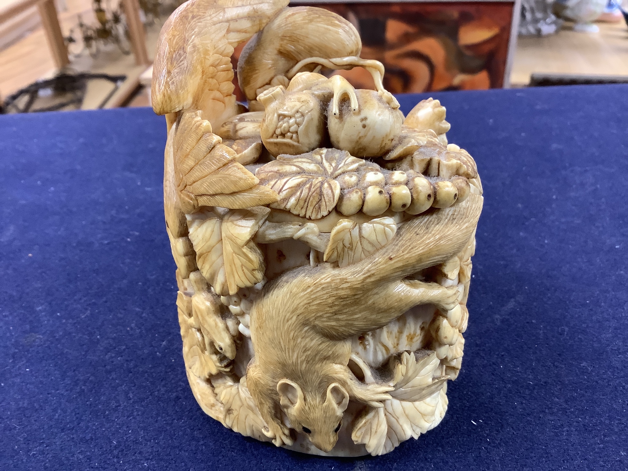 A Japanese ivory box carved with an eagle, frog and squirrels, Meijii period